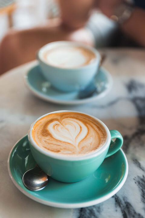 Close up detail of cappuccino with foam art.